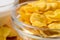 Macro view of glass bowl of cornflakes