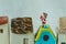 Macro view of miniature figure Santa claus standing on roof chimny as christmas celebration concept