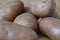 Macro view of red natural potatoes