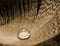 Macro of water drop on white feather detail