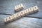 Macro Of The Words IT Security Formed By Wooden Blocks On A Wooden Floor