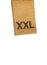 Macro of XXL size clothing label white fabric tag