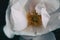 Macro of the yellow stamens inside a white rose