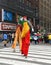 After Macy`s Thanksgiving Day Parade, happy participants go home. Cheerful tall people