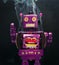 Mad smoking purple robot on black background