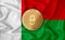 Madagascar flag  ethereum gold coin on flag background. The concept of blockchain  bitcoin  currency decentralization in the