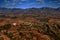 Madagascar landscape. mountain with fields and villages. Nature destruction in Africa, hot season in Madagascar. Orange fields