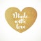 Made with love calligraphic inscription on a gold heart