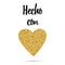 Made with love gold sparkle heart shape, text in Spanish