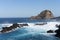 Madeira island wild nature, wave hitting volcanic rocks