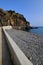 Madeira\'s Coastal Elegance: Seaside Promenade, Volcanic Stones, and Black Beach