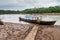 MADIDI, BOLIVIA - MAY 7, 2105: Tour guides in a canoe on Beni river in Madidi National Park, Boliv