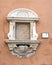 Madonna col Bambino, a sacred niche in Rome