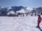 Madonna di Campiglio/Italy - March 6, 2020: Skiers enjoying sunny day at ski slopes near Madonna di Campiglio