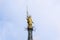 The Madonnina atop Milan Cathedral at the height of 108.5 m in Milan, italy. Milan Duomo is the largest church in Italy