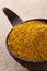 Madras Curry Powder in bowl hessian background