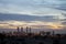 Madrid skyline at sunset, highlighting the four towers of the financial district to the north of the city