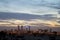 Madrid skyline at sunset, highlighting the four towers of the financial district to the north of the city