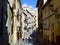 Madrid, Spain - April 2, 2022: colourful different buildings on the old street in Malasana district