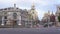 Madrid, Spain - April 9, 2022: Cibeles Fountain and Gran Via de Madrid with vehicles circulating in the morning.