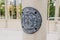 Madrid, Spain - August 25, 2019: Ancient emblem with information on the construction of the glass palace of the Retiro Park