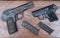 MADRID, SPAIN - AUGUST 5, 2017: Two rusted automatic repeating pistols and their chargers