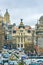 Madrid, Spain - February 13, 2014: Cars passing on the Gran Via, just before the famous Metropolis building. In Metropolis was bu