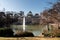 MADRID, SPAIN. JAN 2020: Palacio de Cristal building in front of the lake and fountain in the Parque del Retiro