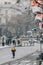 Madrid  Spain - January 2021: Glovo rider in Alacala street with hevy snow due to Filomena Storm.