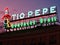 Madrid, Spain Tio Pepe famous brand of Sherry sign neon at dusk in Puerta del Sol