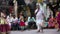 MADURAI, INDIA - MARCH 2013: Girl selling newspapers