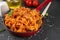 Mafaldine pasta with bolognese tomato sauce