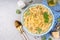 Mafaldine pasta with white creamy sauce