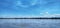 Magdalena river picture with its floodplain in the horizon in a blue sky day with some clouds