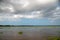 Magdalena River with river vegetation on a cloudy day.