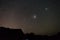 Magellanic Clouds astro starry sky, Namibian night, Africa. Acacia trees in the foreground. Adventure into the wild.