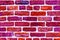 Magenta color brick wall texture background