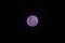 Magenta color effect on super moon at night