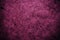 Magenta vintage background. Rough pink and magenta texture and background for designers. Close up view of abstract pink and magent