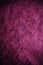 Magenta vintage background. Rough pink and magenta texture and background for designers. Close up view of abstract pink and magent