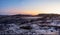 Magenta winter dawn. Panoramic icy landscape and mountains in the Russian village Teriberka