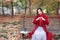 Magic autumn,Fall woman happy and bliss , Beautiful woman Sitting on a bench in autumn park