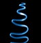 Magic blue light spirals on black background.
