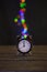 Magic clock on the wooden table