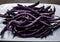 Magic colorful purple beans which turn Green after cooking, fresh healthy vegetables