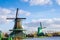 Magic Dutch landscape with traditional air mill in Zaanse Schans, Holland, Europe.