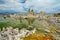 Magic of Mono Lake. Outliers - bizarre calcareous tufa formation on the smooth water of the lake.