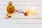 magic potion and amber necklace on wooden background