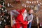 Magic Santa Claus and little boy fooling around and have fun tog