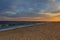 Magic sunset view seascape with beautiful colorful sky, sun and clouds. Smooth sand on the beach  white foam of ocean. Karon